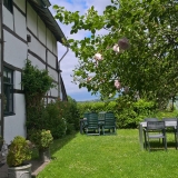 Frensjerhofke Vakantiewoningen  tuin bij de Lijster