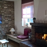 Frensjerhofke Vakantiewoningen de Merel woonkamer
